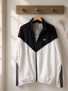 Adidas women’s black and White Chevron Track Windbreaker Jacket